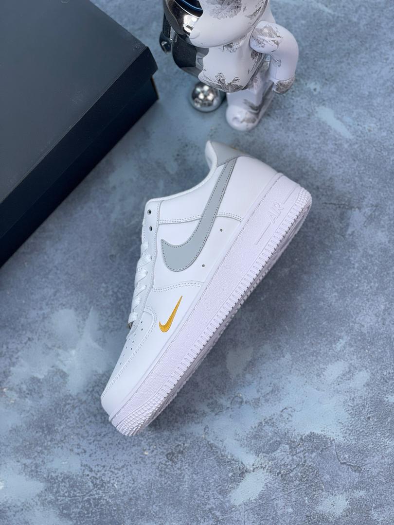 Nike Air Force grey and gold